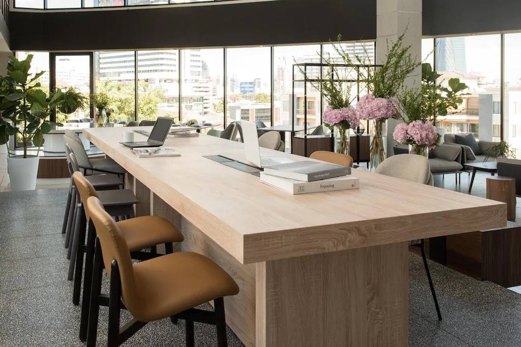 Amanta Sathorn coworking space with modern design, comfortable seating, and natural lighting